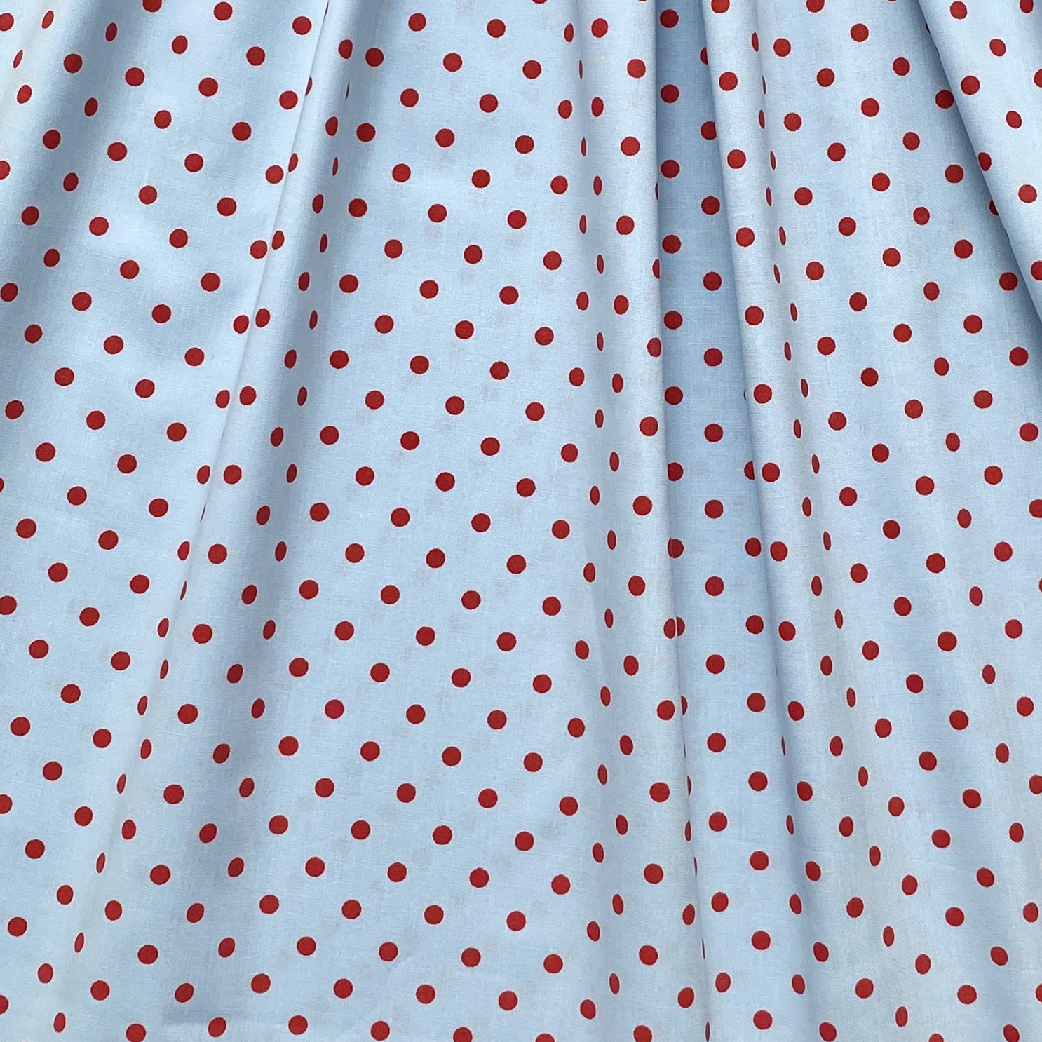 Tissu coton bleu clair pois rouge