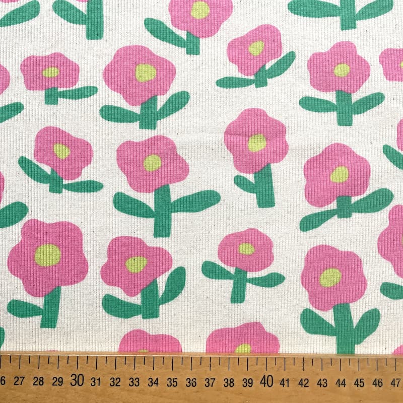 Tissu jersey côtelé fleurs rose fond écru