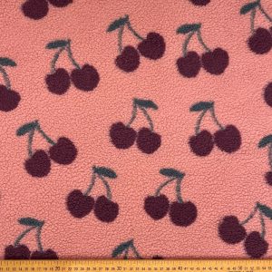 Tissu sherpa cerises fond rose