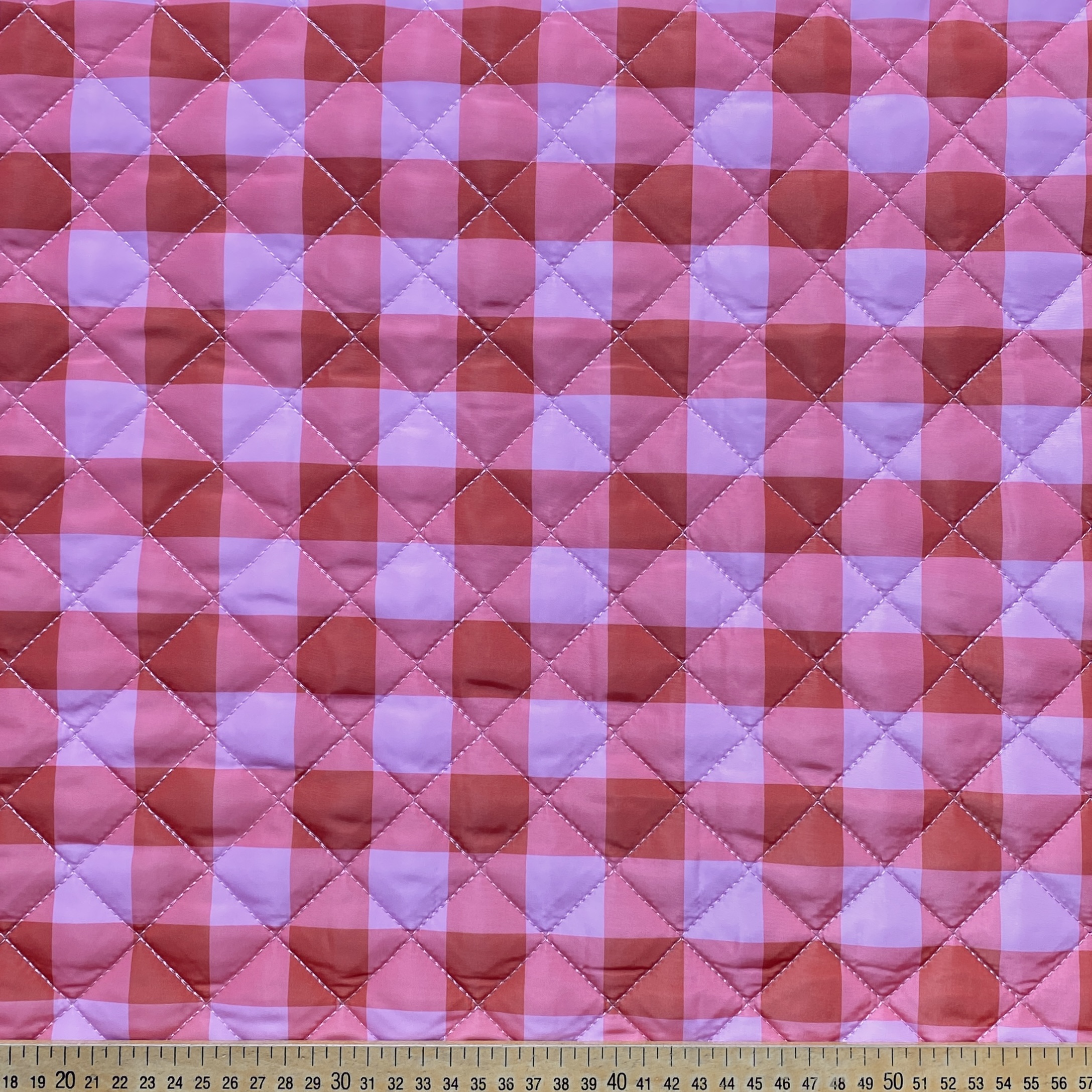 Tissu matelassé carreaux rose